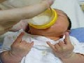 http://www.inspirefusion.com/funny-fingers-expressions-of-baby-drinking-milk/