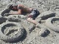 http://www.inspirefusion.com/drunk-guy-on-sand-motorcycle-on-beach/